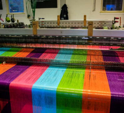 Modern weaving machine producing elaberate patterned textile for the World markets